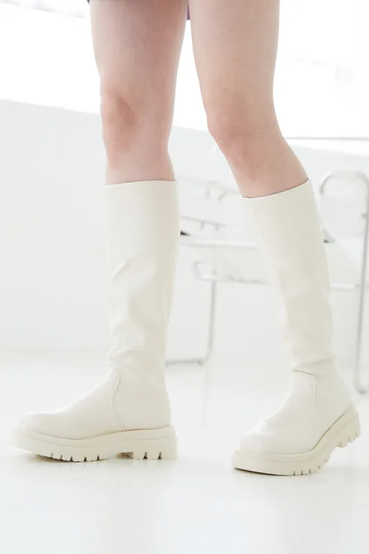 Claire Stretchy Flatform Boots sold by storets