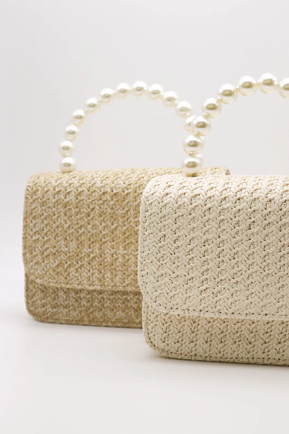 Faux Pearl Handle Straw Bag sold by storets