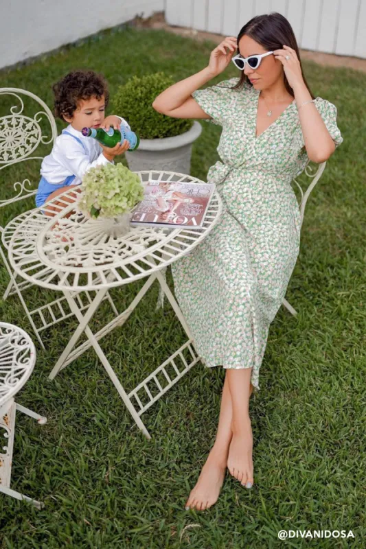 Katy Faux Wrap Dress In Floral made by storets