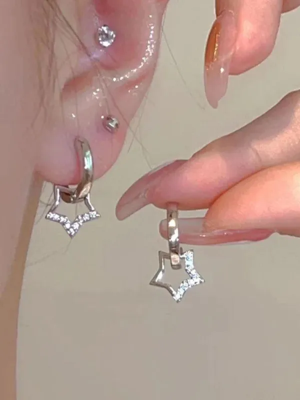 Hollow star rhinestone hoop earring sold by Streetwear Society