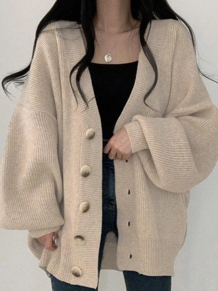 Knitted button down long cardigan sold by Streetwear Society