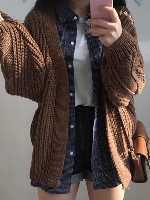 Open front cable knit cardigan sold by Streetwear Society