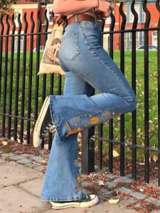 Flared jeans with floral embroidery sold by Streetwear Society