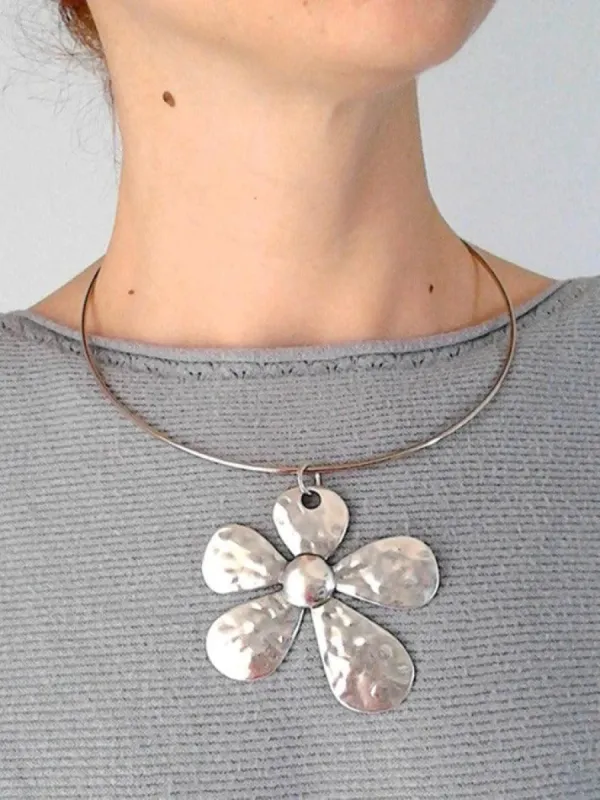 Silver large flower pendant necklace sold by Streetwear Society