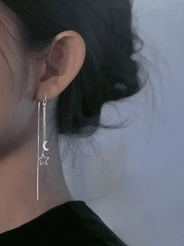 Tassel earrings decorated with stars and moon sold by Streetwear Society