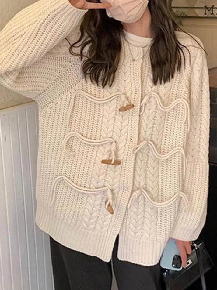 Vintage twist design horn buckle cardigan sold by Streetwear Society