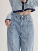 Faded boyfriend jeans with exposed seams sold by Streetwear Society