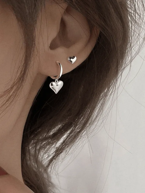 Irregular heart pendant hoop earring sold by Streetwear Society