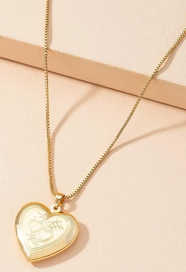 heart shaped pendant necklace sold by Streetwear Society