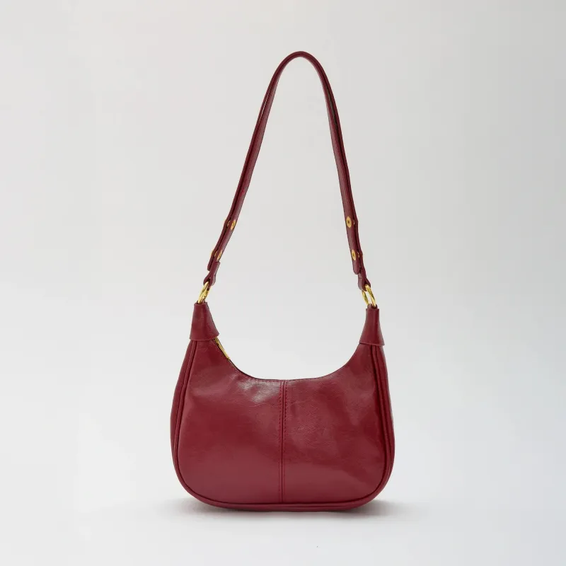 Baya | Smooth Faux Leather Half-Moon Bag sold by Streetwear Society