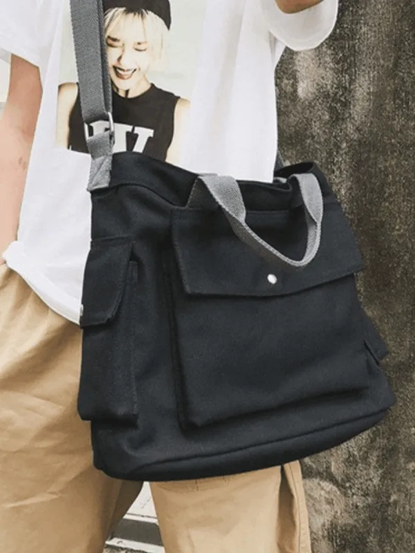 Large canvas shoulder bag with pocket sold by Streetwear Society