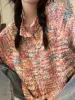 Rainbow front button cardigan sold by Streetwear Society