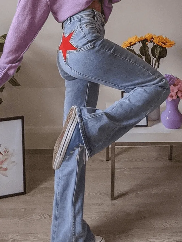 Flared jeans with star patchwork on the back sold by Streetwear Society