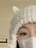 Warm fluffy lambskin trapper hat sold by Streetwear Society