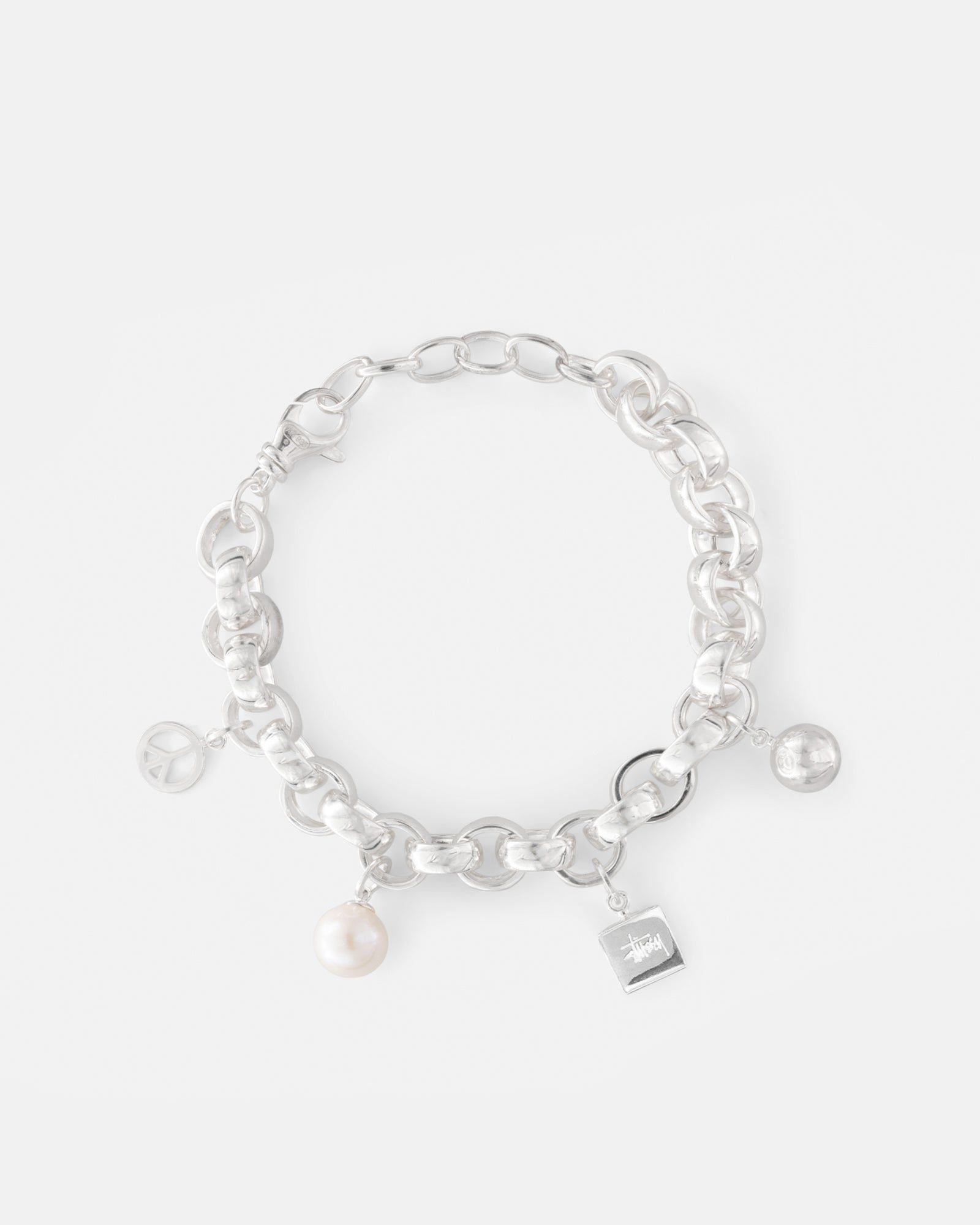 ICON CHARM BRACELET STERLING SILVER sold by Stussy