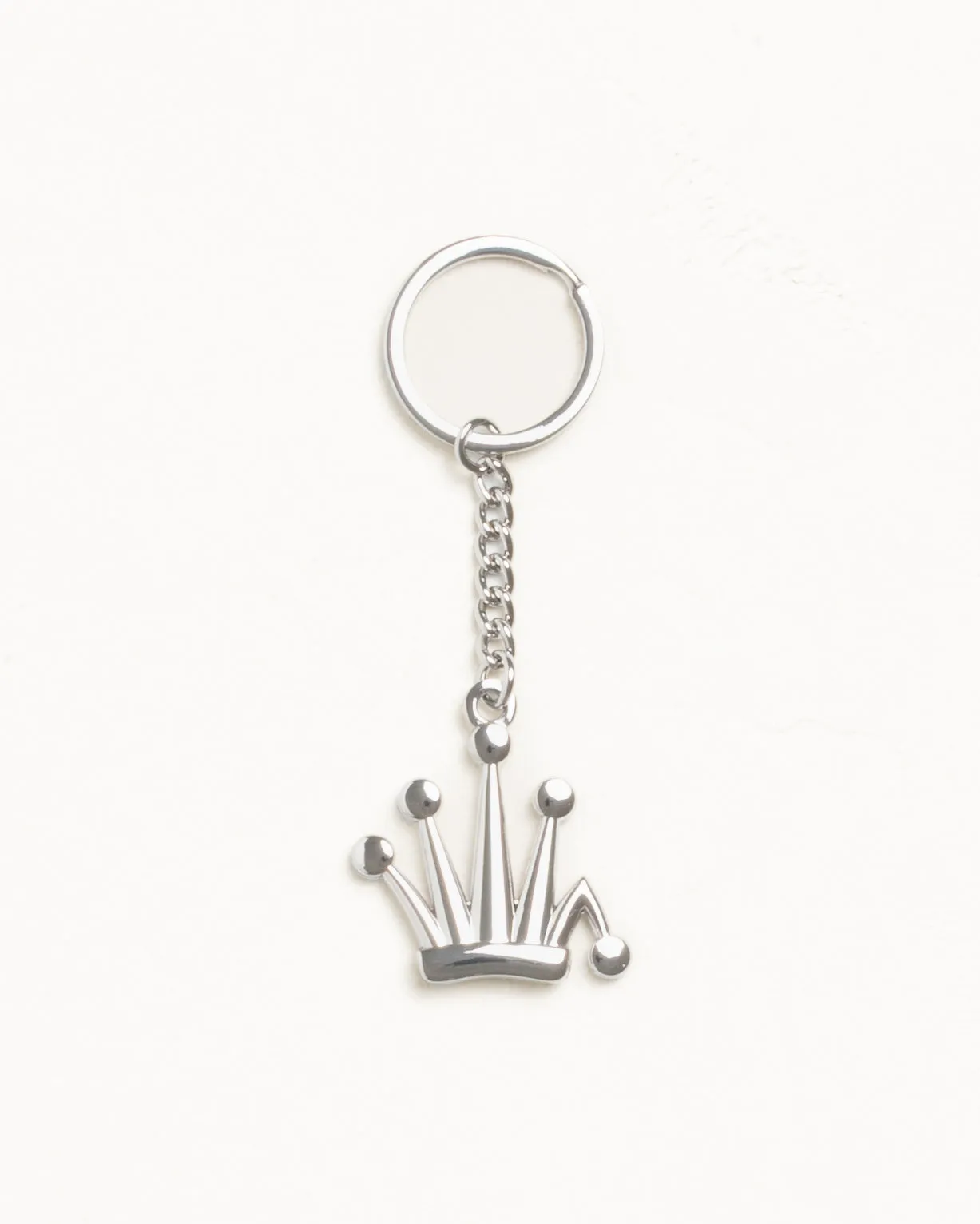 METAL BENT CROWN KEYCHAIN sold by Stussy