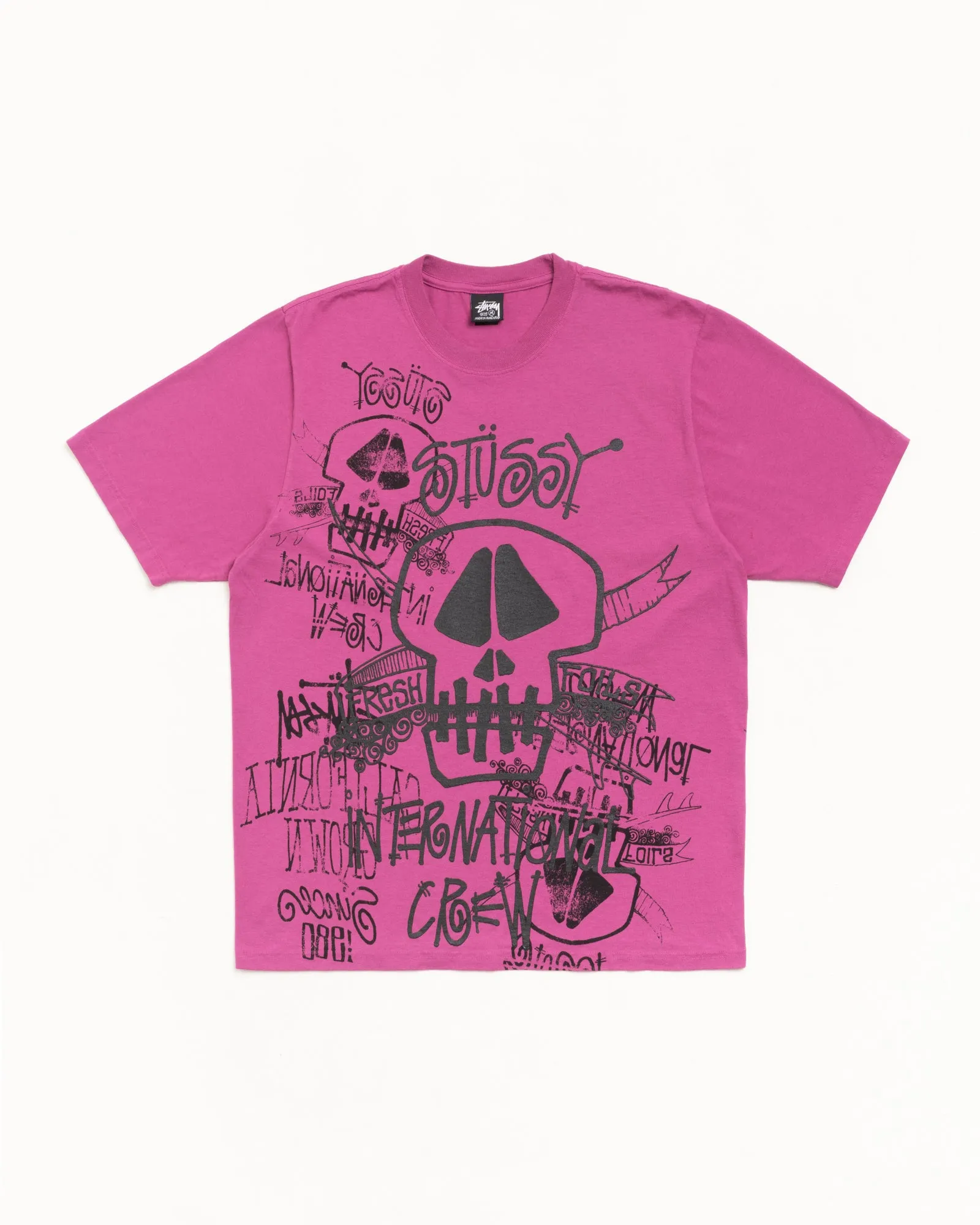 SKULLS TEE PIGMENT DYED sold by Stussy