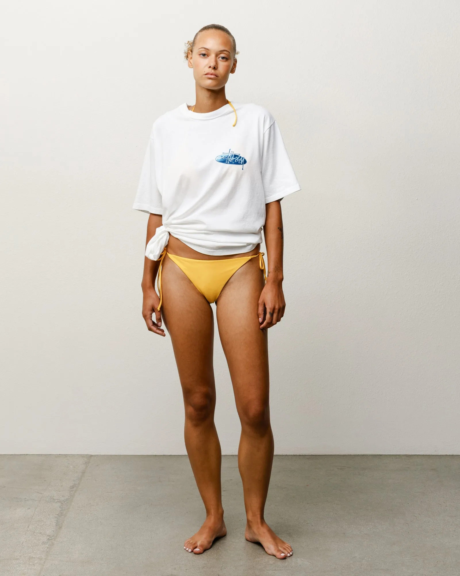 SIDE TIE BIKINI BOTTOM sold by Stussy