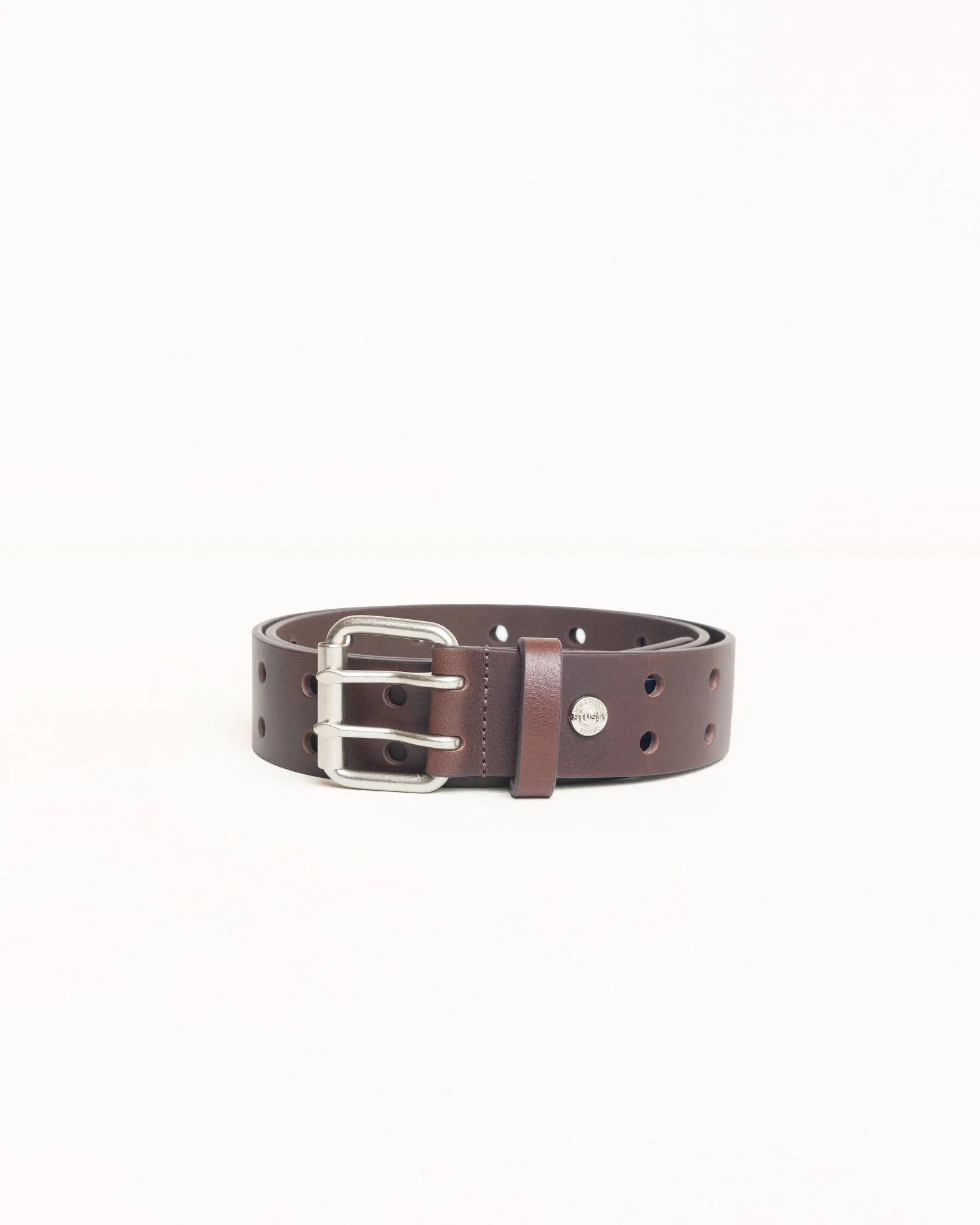 PUNCH OUT LEATHER BELT sold by Stussy