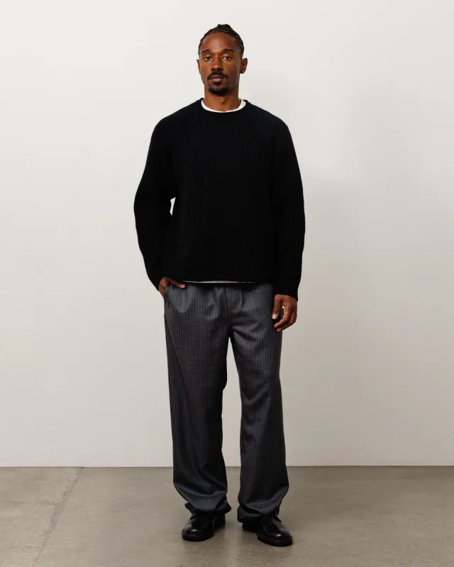MERINO ROLL NECK SWEATER made by Stussy
