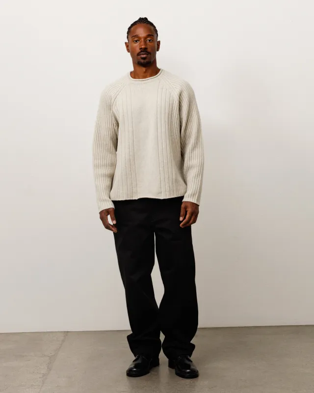 MERINO ROLL NECK SWEATER made by Stussy