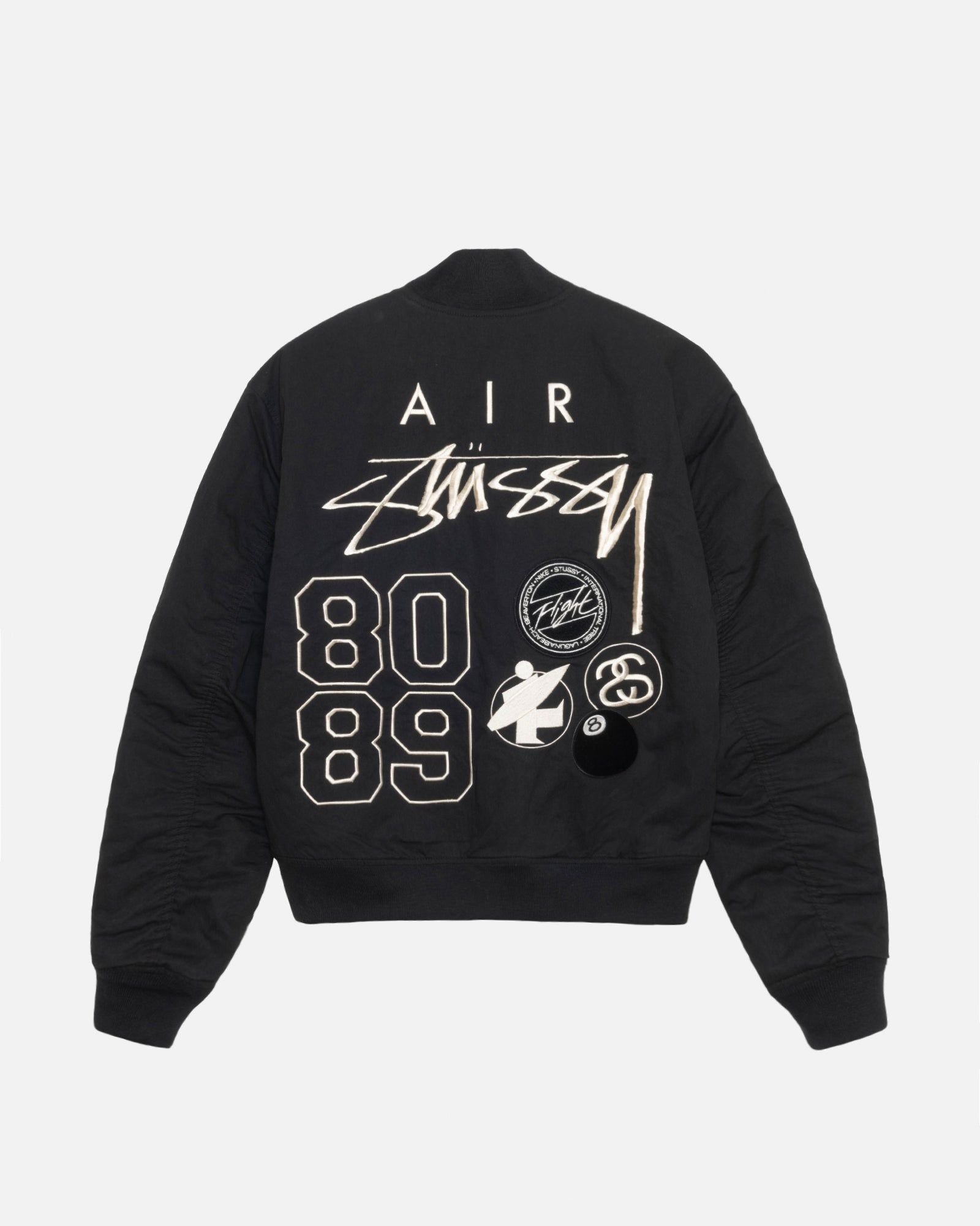 STÜSSY & NIKE REVERSIBLE VARSITY JACKET sold by Stussy