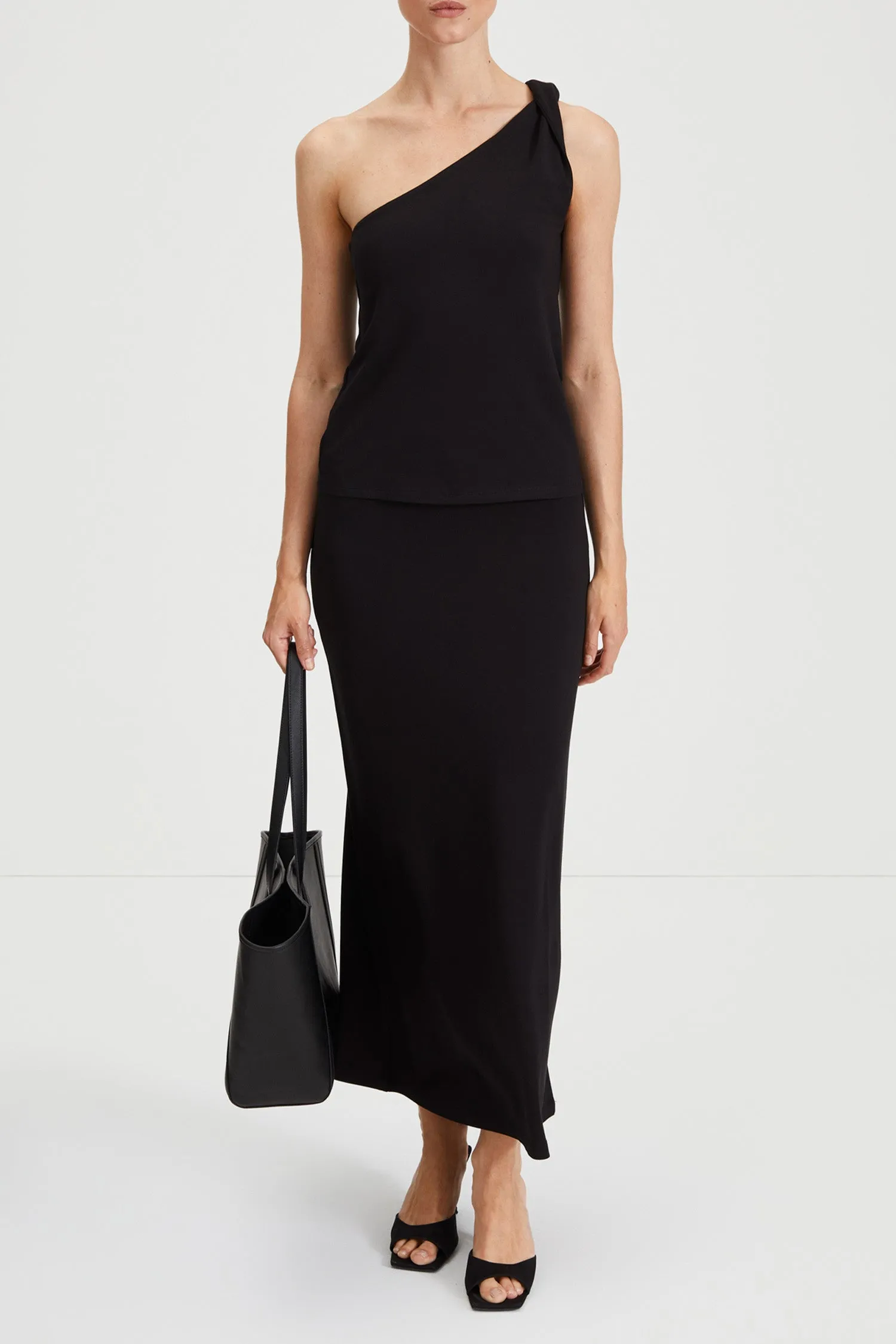 CLAUDI LONG SKIRT - BLACK sold by Stylein
