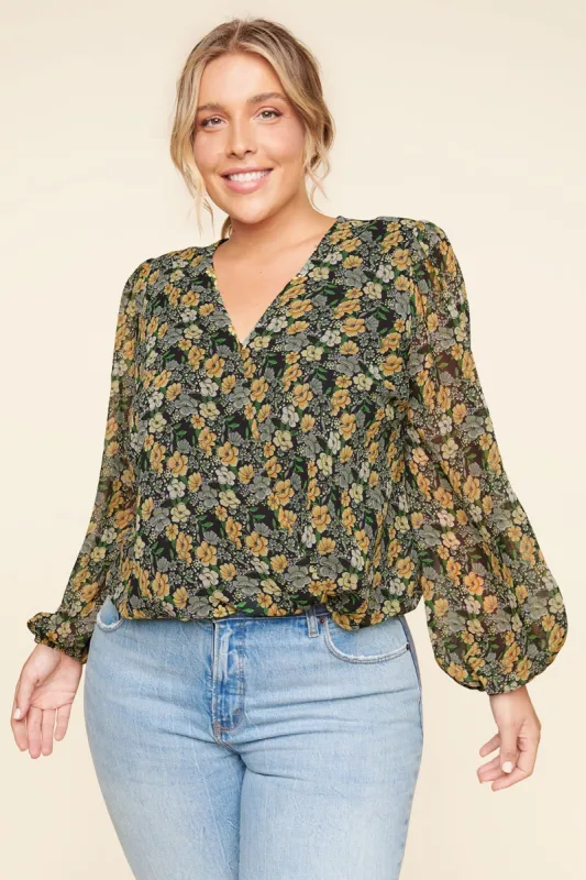 Wishful Thinking Marleena Floral Surplice Blouse Curve sold by Sugarlips