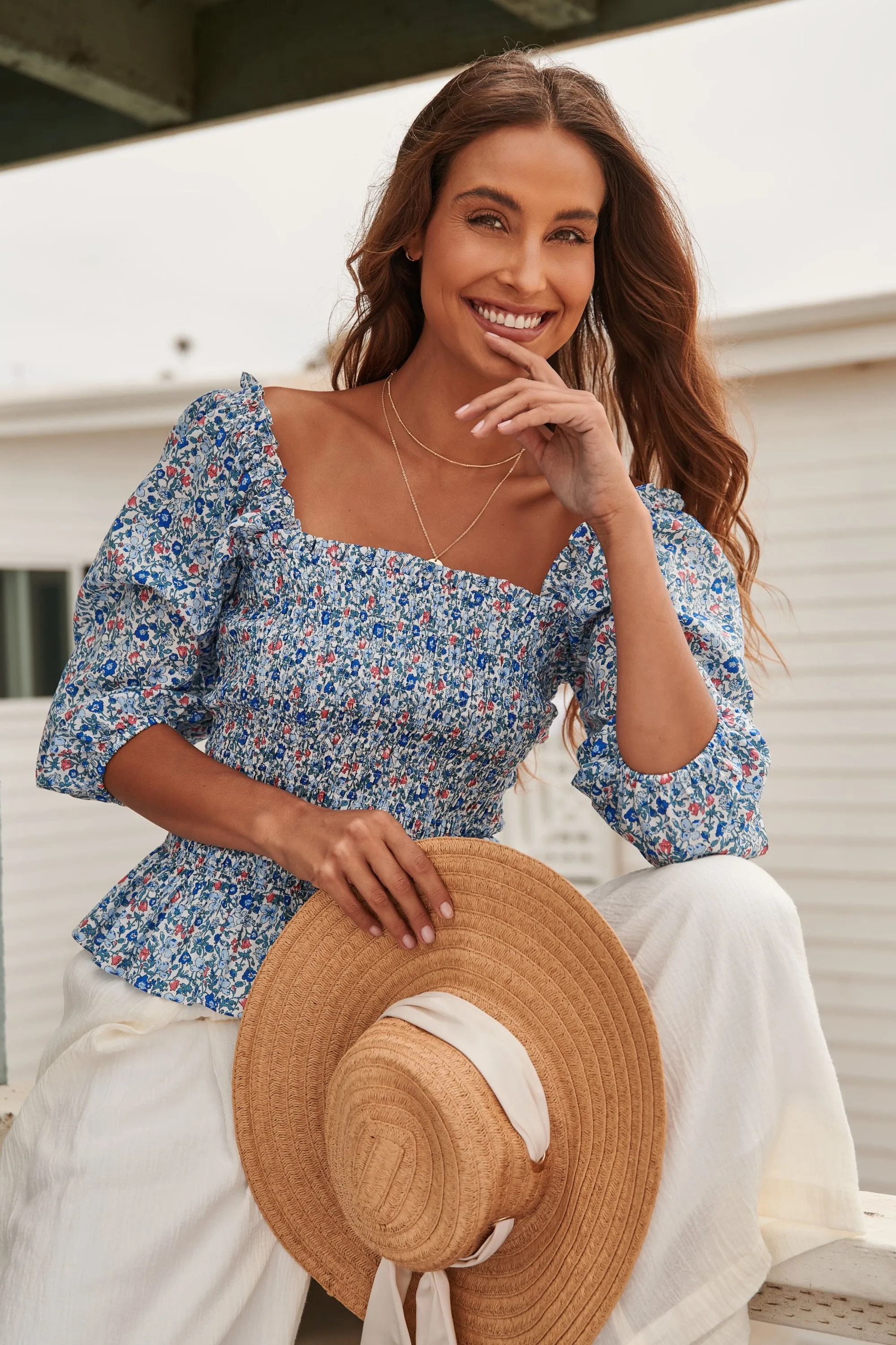 Penelope Smocked Peplum Top sold by Sugarlips