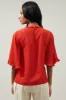 Heartbreaker Bell Sleeve Ruffle Blouse sold by Sugarlips