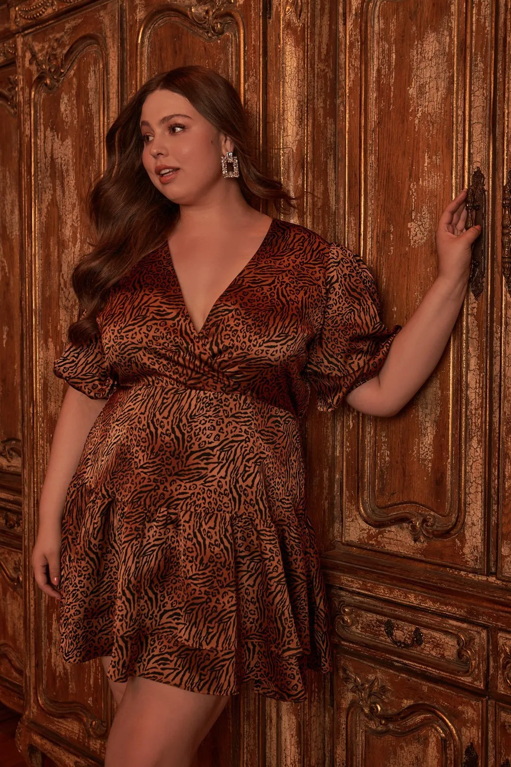 Leonna Animal Print Surplice Puff Sleeve Mini Dress Curve sold by Sugarlips