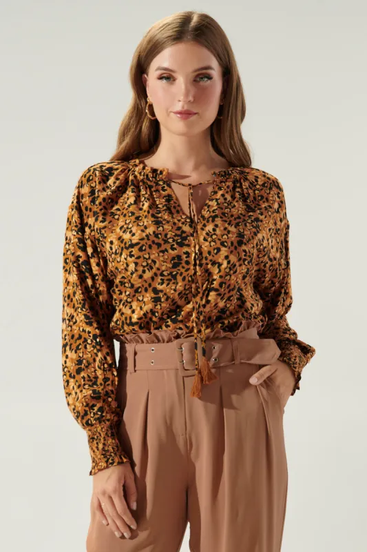 Easy to Love Leopard Weylin Ruffle Tassel Blouse sold by Sugarlips
