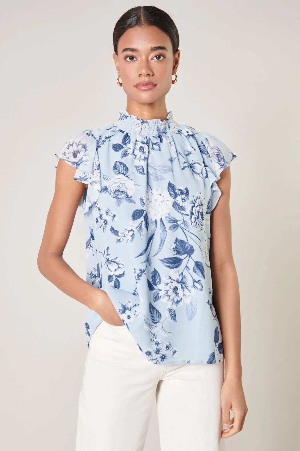 Cadaval Floral Mock Neck Flowy Blouse sold by Sugarlips