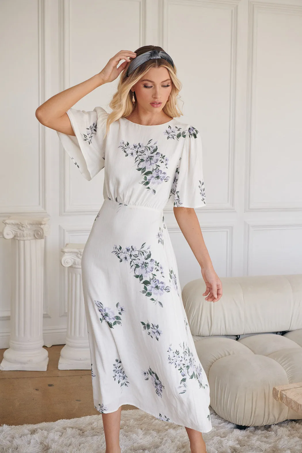 Porto Floral Smocked Midi Dress sold by Sugarlips