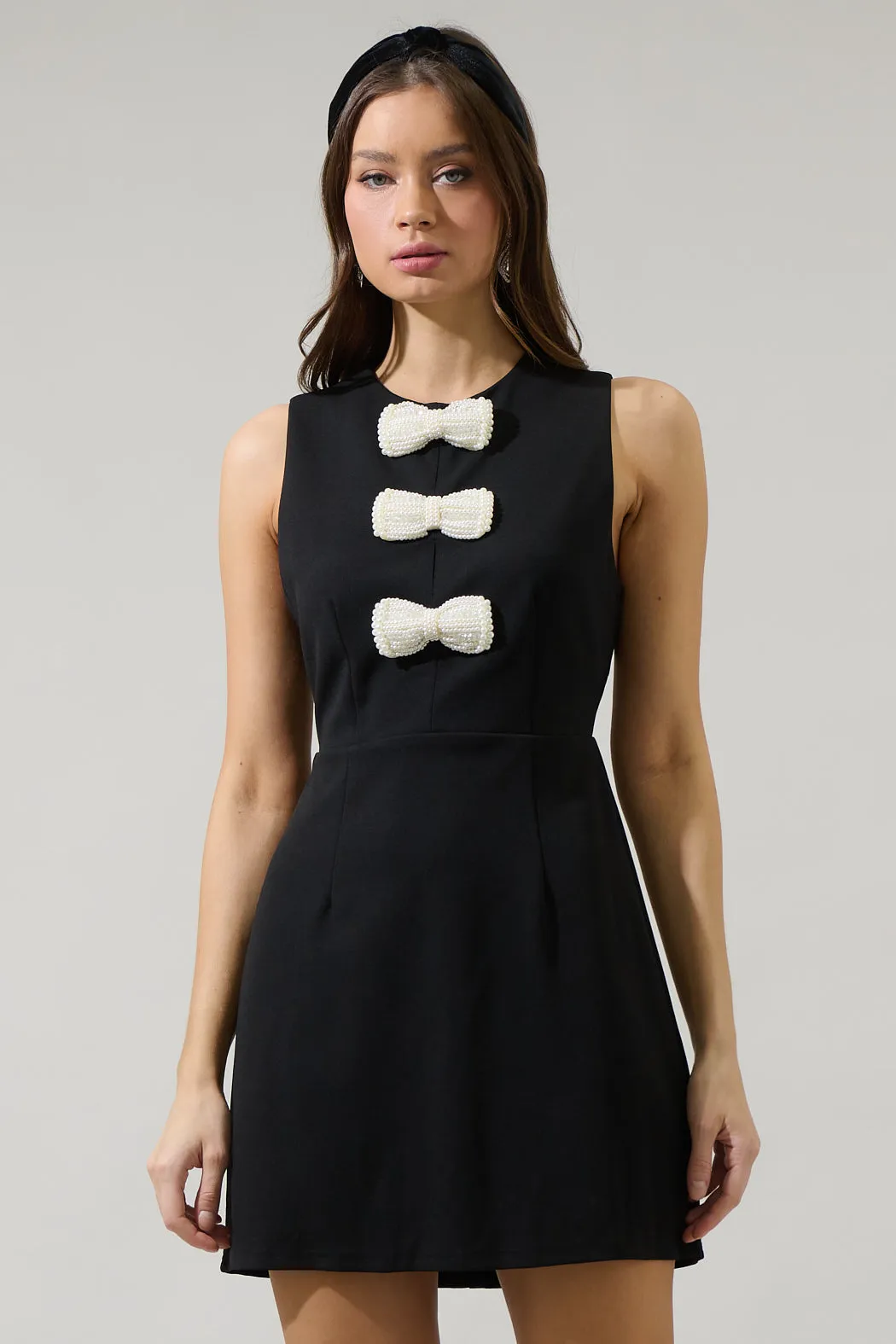 Tiffany Bow Amy Sleeveless Mini Dress sold by Sugarlips