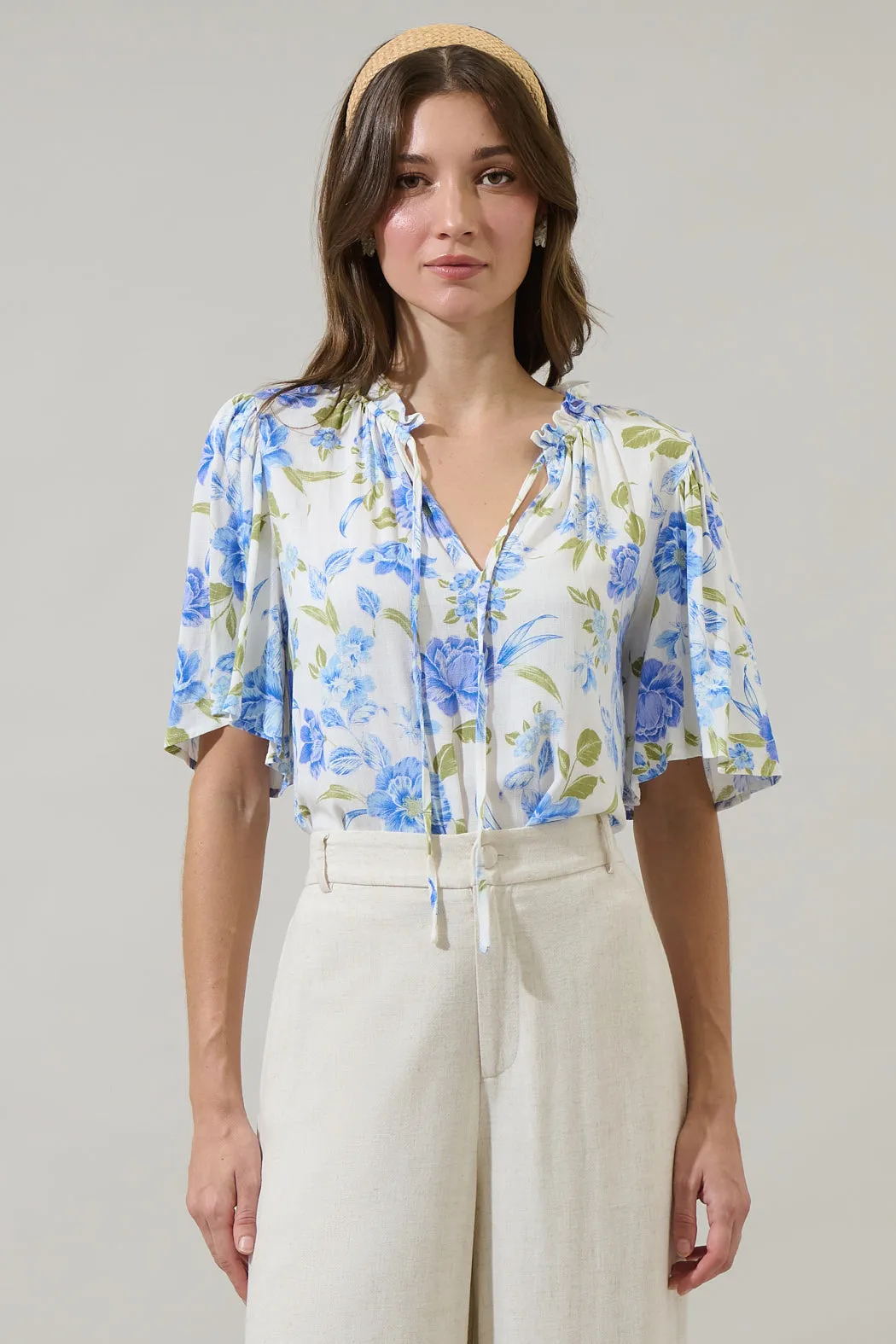 Milla Floral Ruffle Split Neck Dupont Top sold by Sugarlips