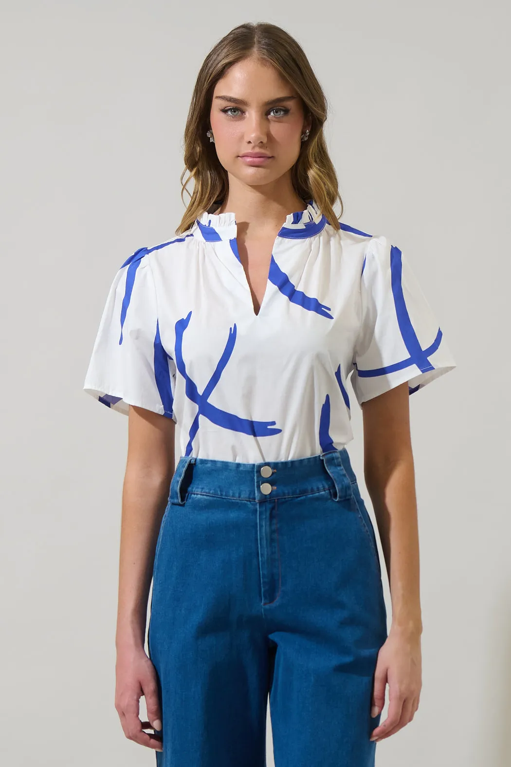Dorma Strokes Reva Split Neck Top sold by Sugarlips