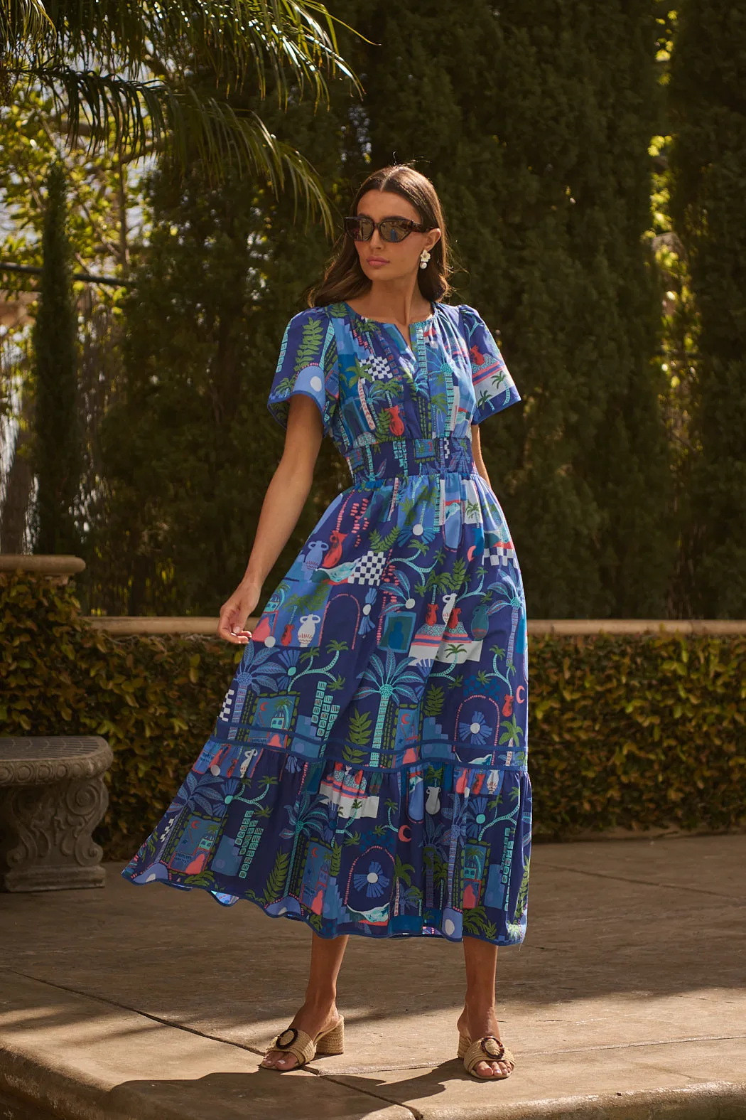 Punta Alta Ordy Smocked Midi Dress sold by Sugarlips