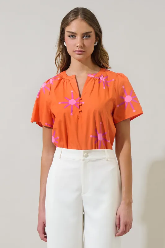 Karani Starburst Xoey Split Neck Top sold by Sugarlips