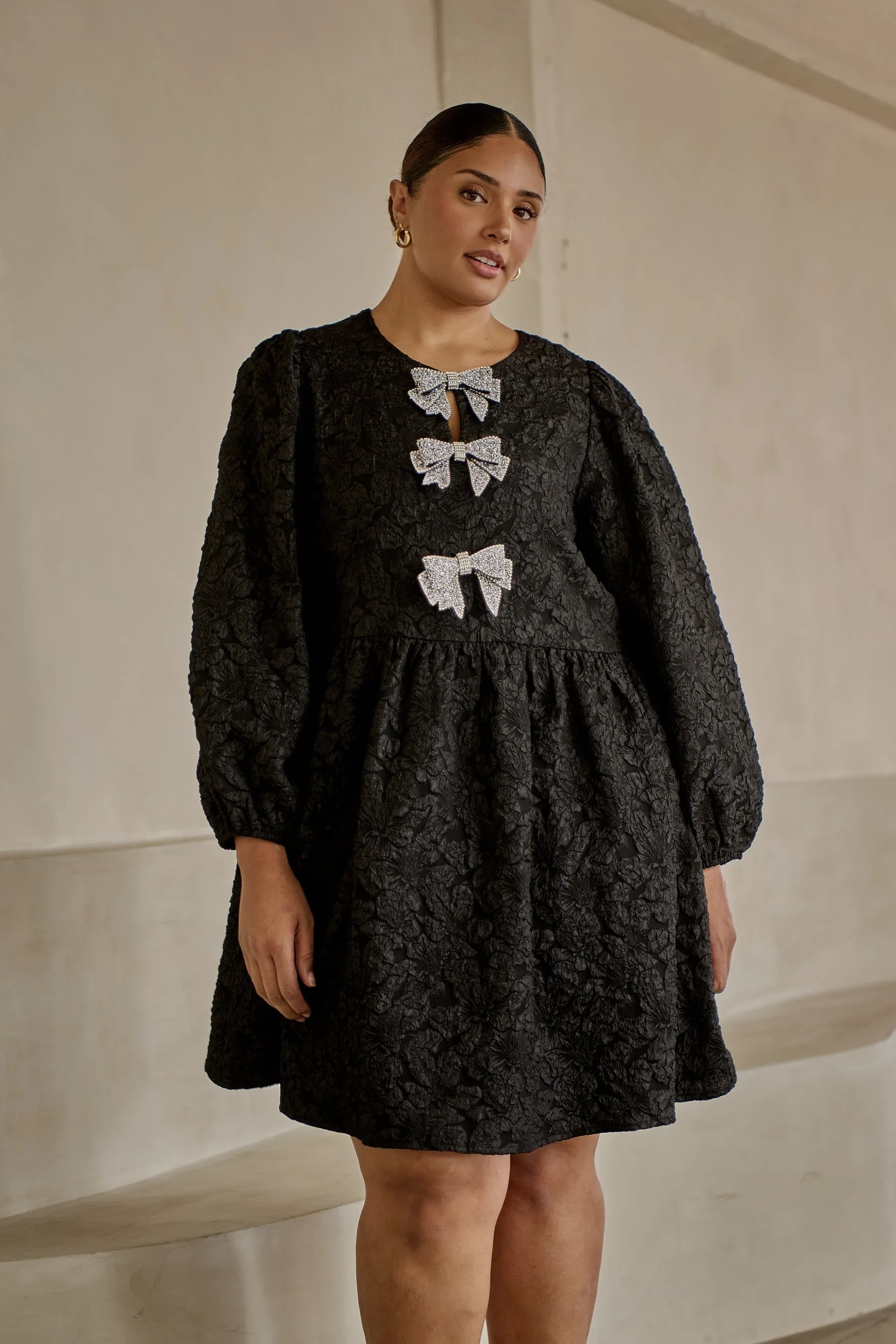 Arielle Jacquard Glow Bow Dress Curve sold by Sugarlips