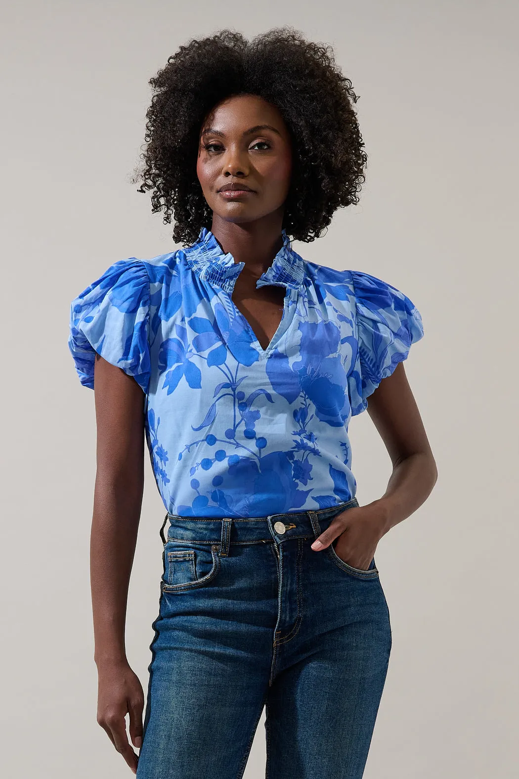 Veran Floral Poly Smocked Top sold by Sugarlips