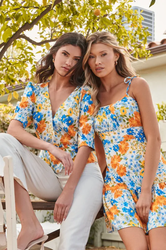 Sea Breeze Double Breasted Peplum Top sold by Sugarlips