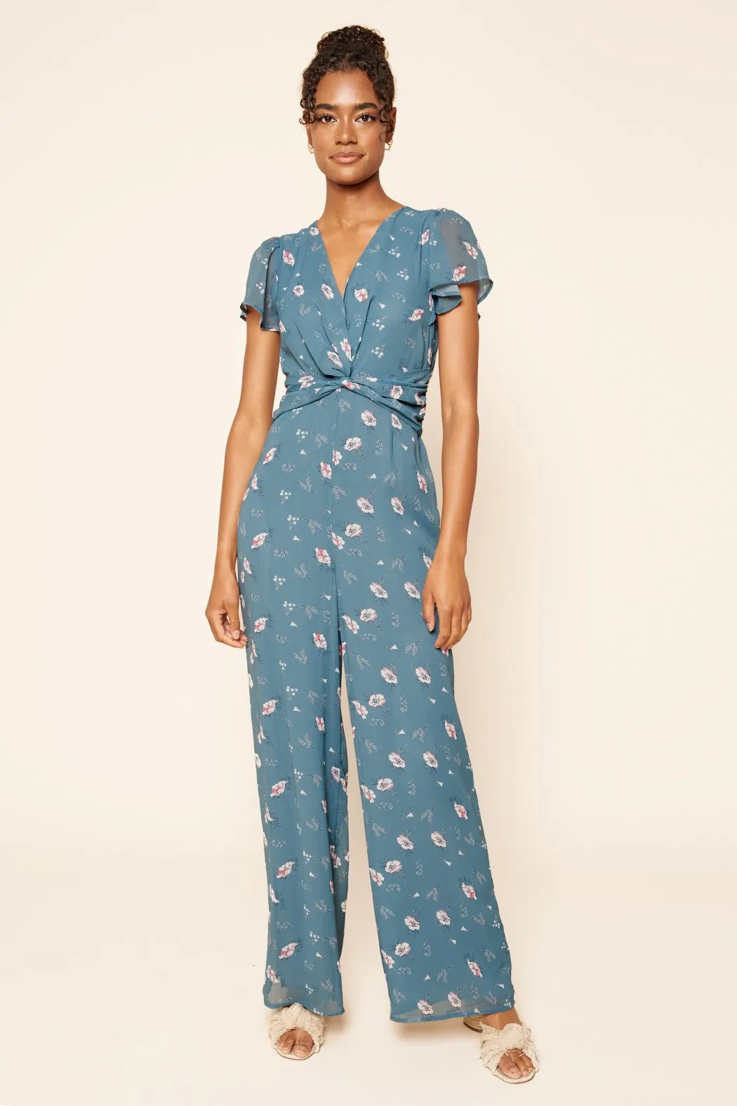 Savvy Floral Twist Front Jumpsuit sold by Sugarlips