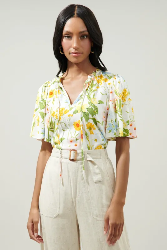 Free to Be Ruffle Split Neck Dupont Top sold by Sugarlips