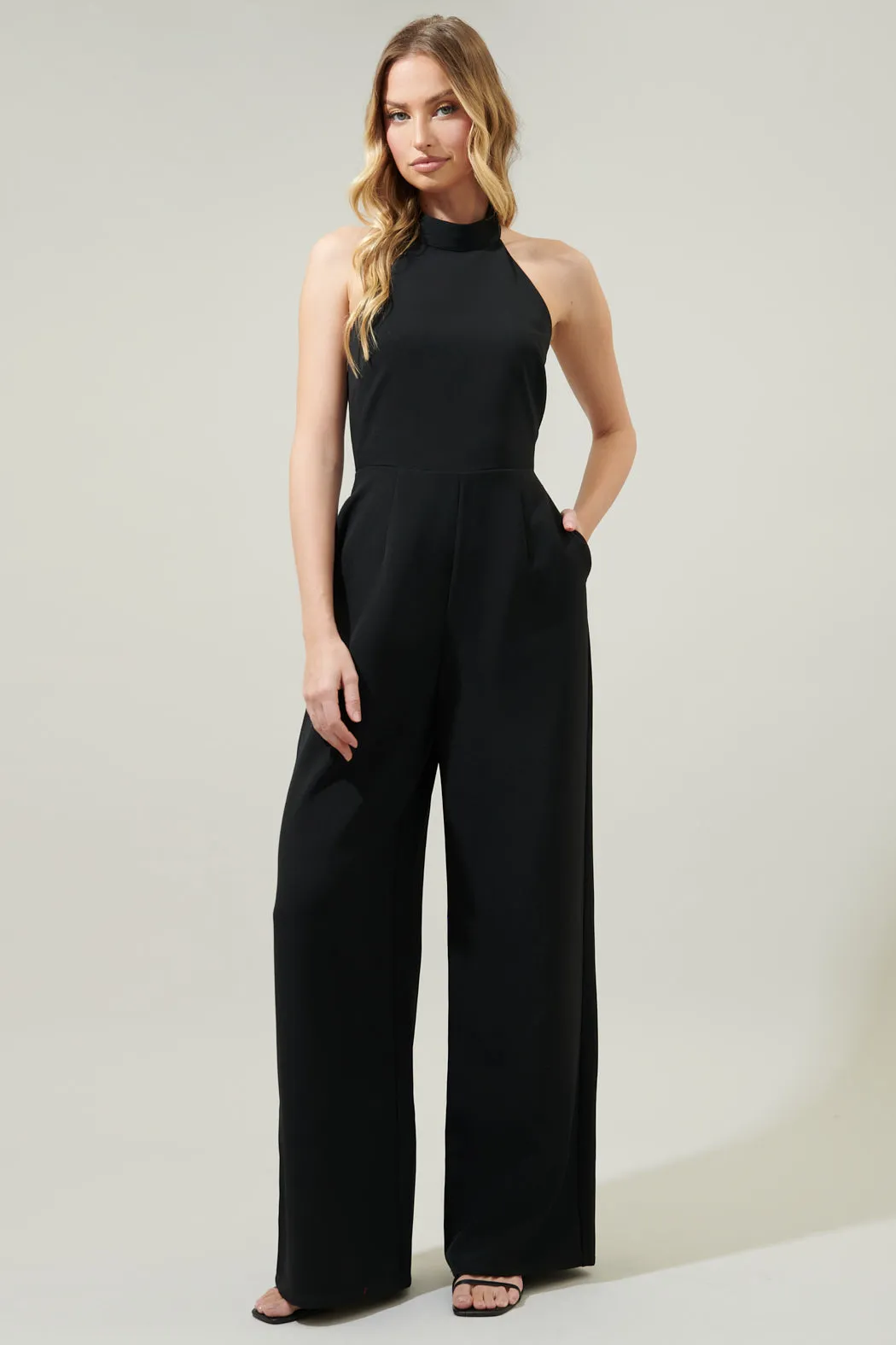 After Hours Backless Halter Jumpsuit sold by Sugarlips