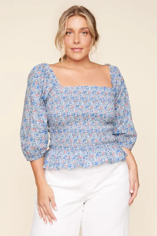 Penelope Smocked Peplum Top Curve sold by Sugarlips