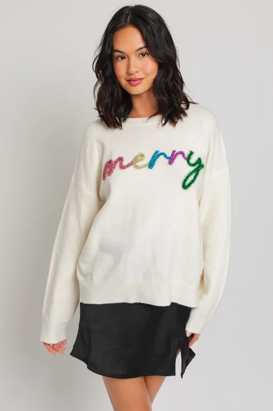 Tinsel Merry Sweater sold by Sun n Moon