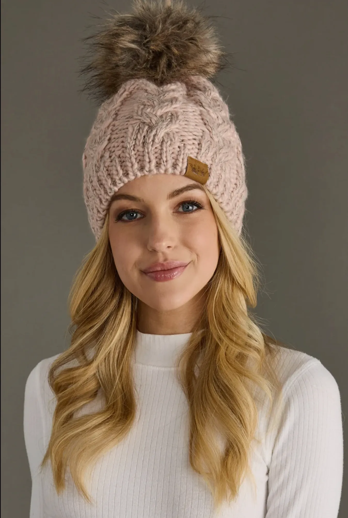 Cable Knit Pom Hat sold by Sunbeam