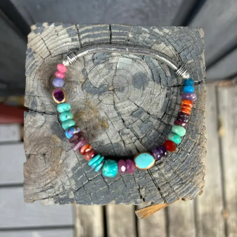 Small Sunset over Ocean Silver Stretch Bracelet sold by Sunbeam
