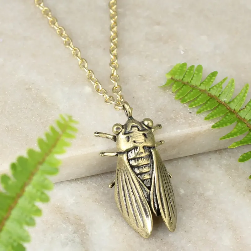 Gold Cicada Insect Necklace sold by Sunbeam